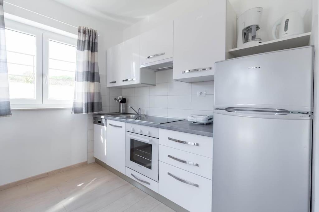 Apartments Punta Премантура Екстериор снимка